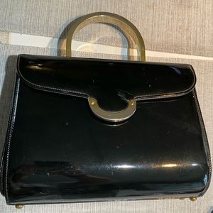 Never used. Vintage handbag. Black leather